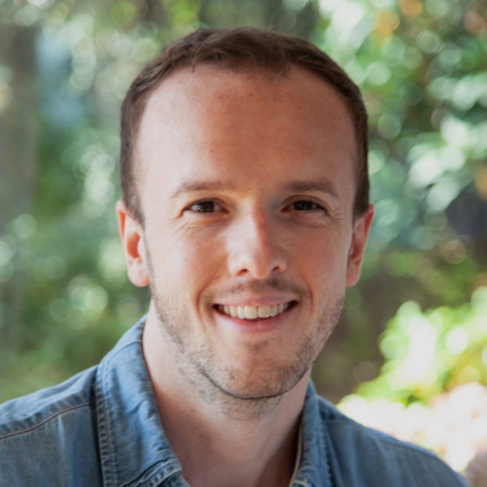 Headshot photo of researcher Patrick Thompson