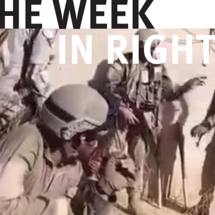 Paramilitary group wields weapons. 